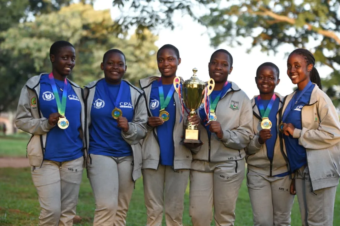 Mpoma students with woodball medals and trophy
